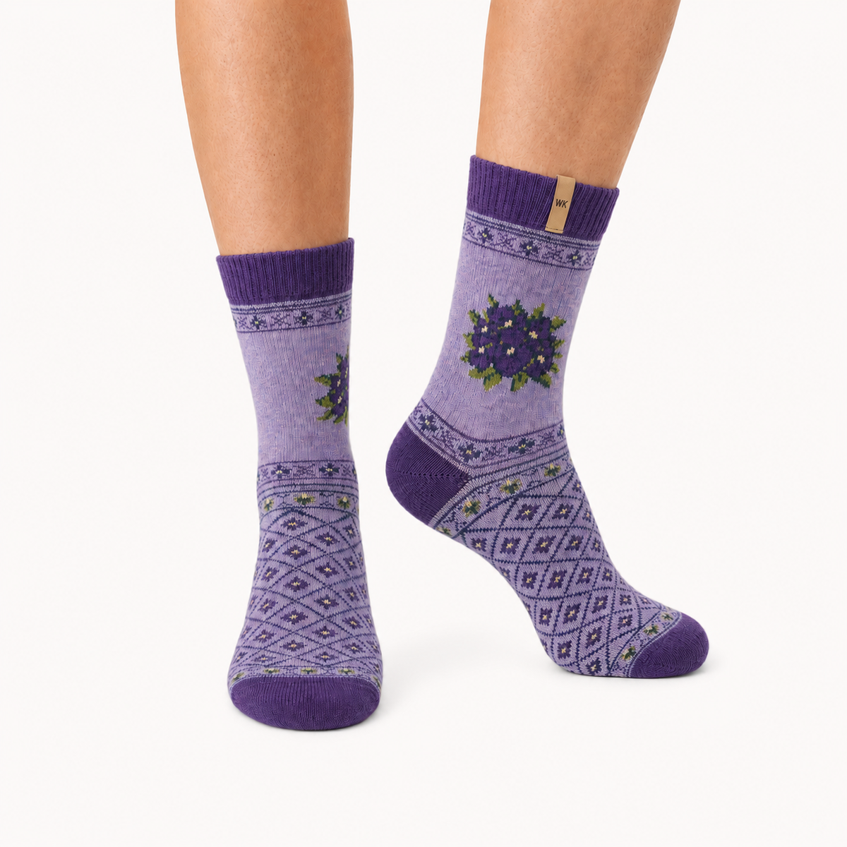 Alpine Violet merino wool crew socks for women, a violet posy on heather lilac with a diamond lattice underfoot