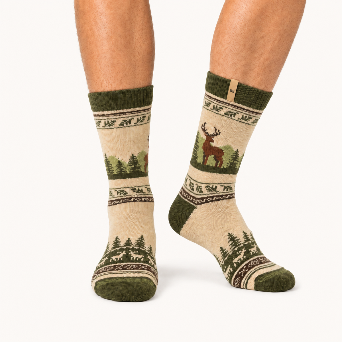 Forest Stag merino wool crew socks for men, a stag standing in pine woods, banded in olive and oxblood on cream