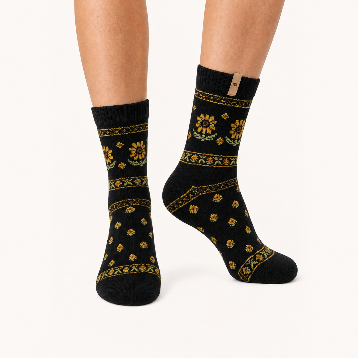 Midnight Sunflower merino wool crew socks for women, gold and green sunflowers on black